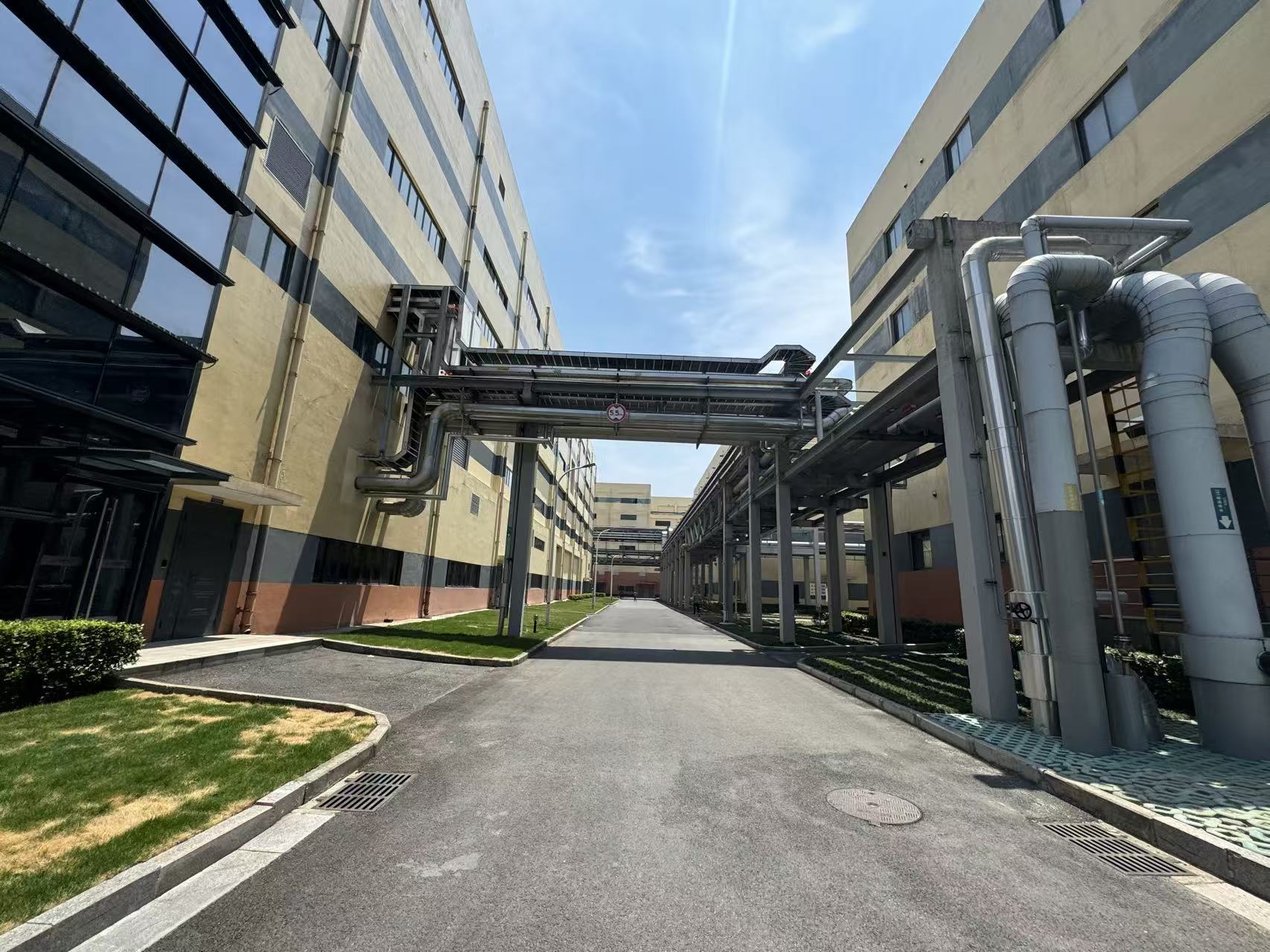 Factory buildings and production pipework at the Linyi manufacturing site